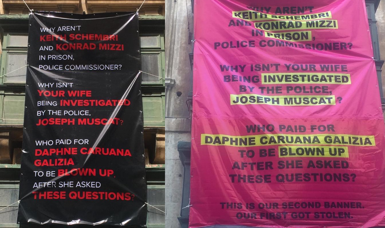 The two banners that were taken down by the planning authority, tied to the balcony of a privately-owned building in Valletta.